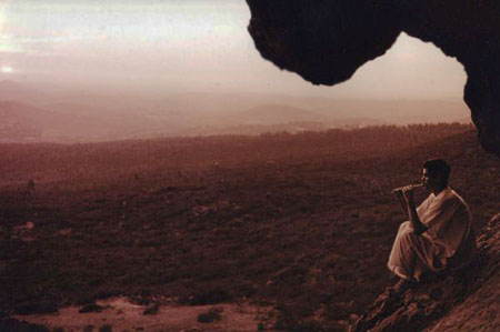 Mohamed El Attar plays at sunset in the Cave of  Boujeloudia / Pan. - Click Here For More Photos! - Photo by Frank Rynne.